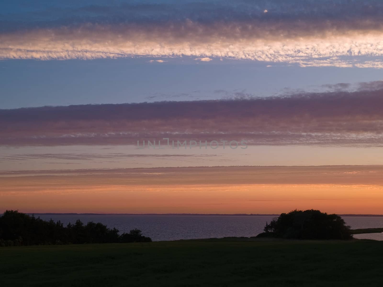 Dramatic majestic colorful sunset over the sea ocean