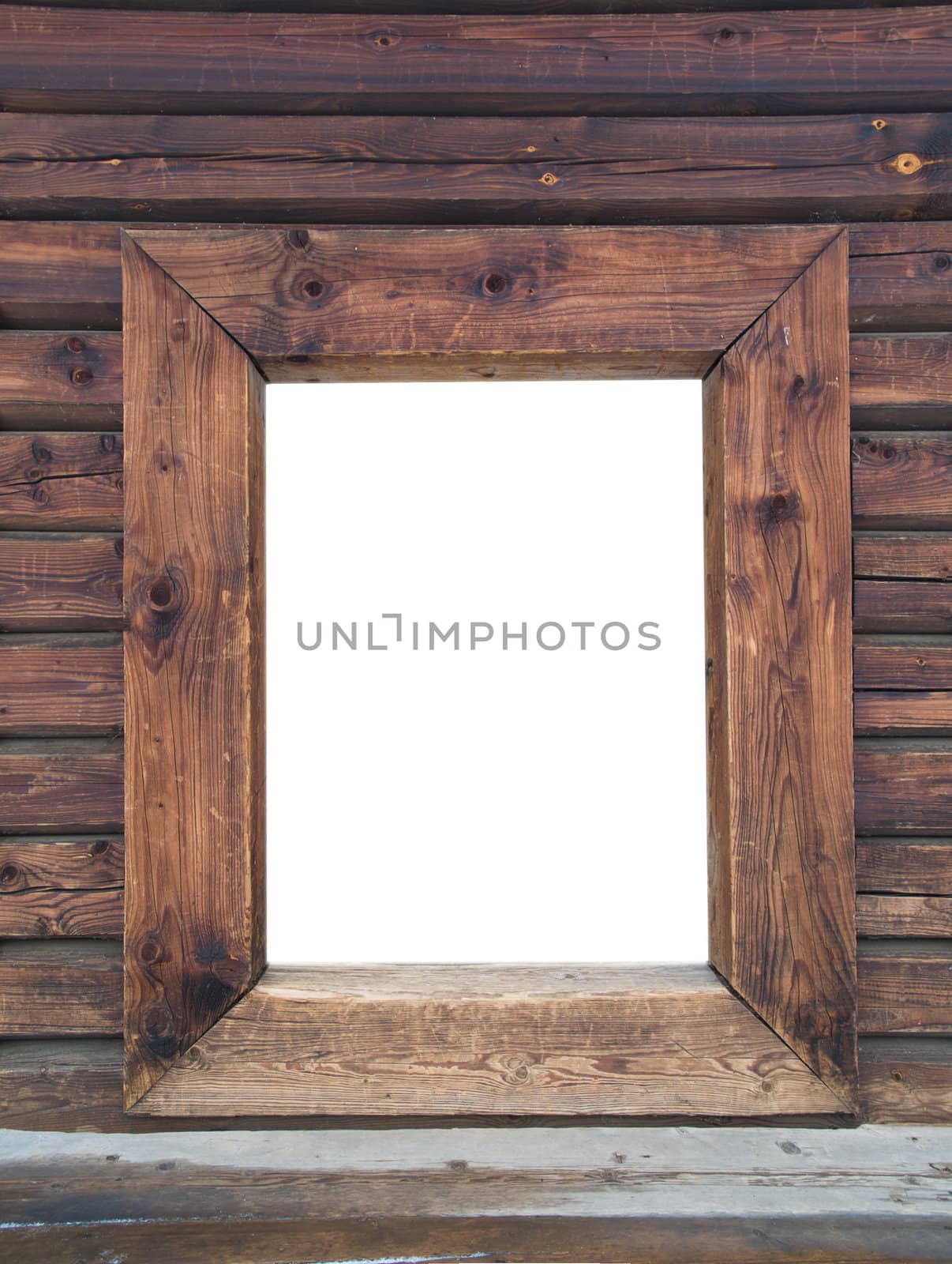 Aged weathered wooden frame on a wall. Isolated on white