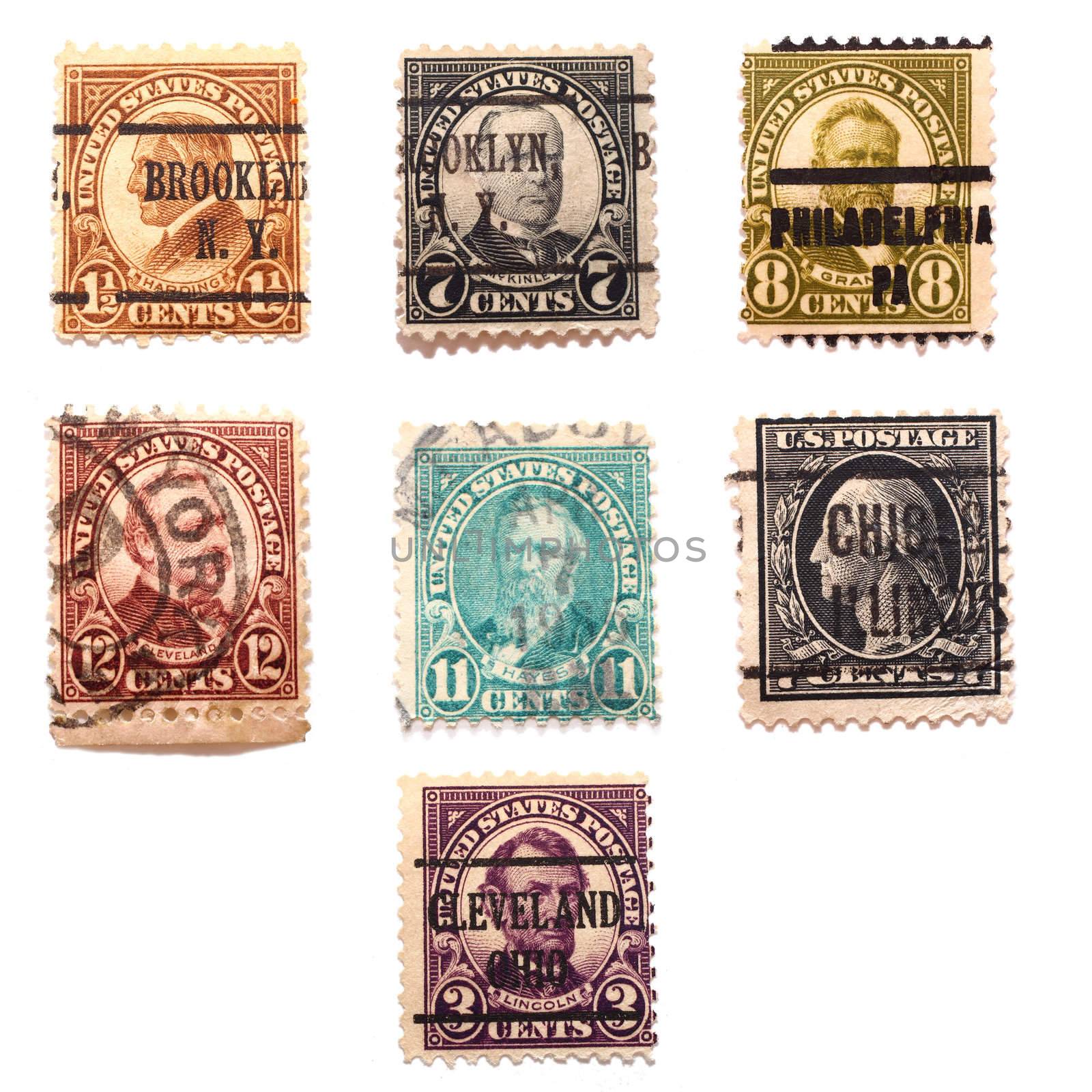 Stamps of seven US presidents: Abraham Lincoln, George Washington, William Harding, William McKinley, Rutherford Haynes, Ulysses Grant, and Groover Cleveland