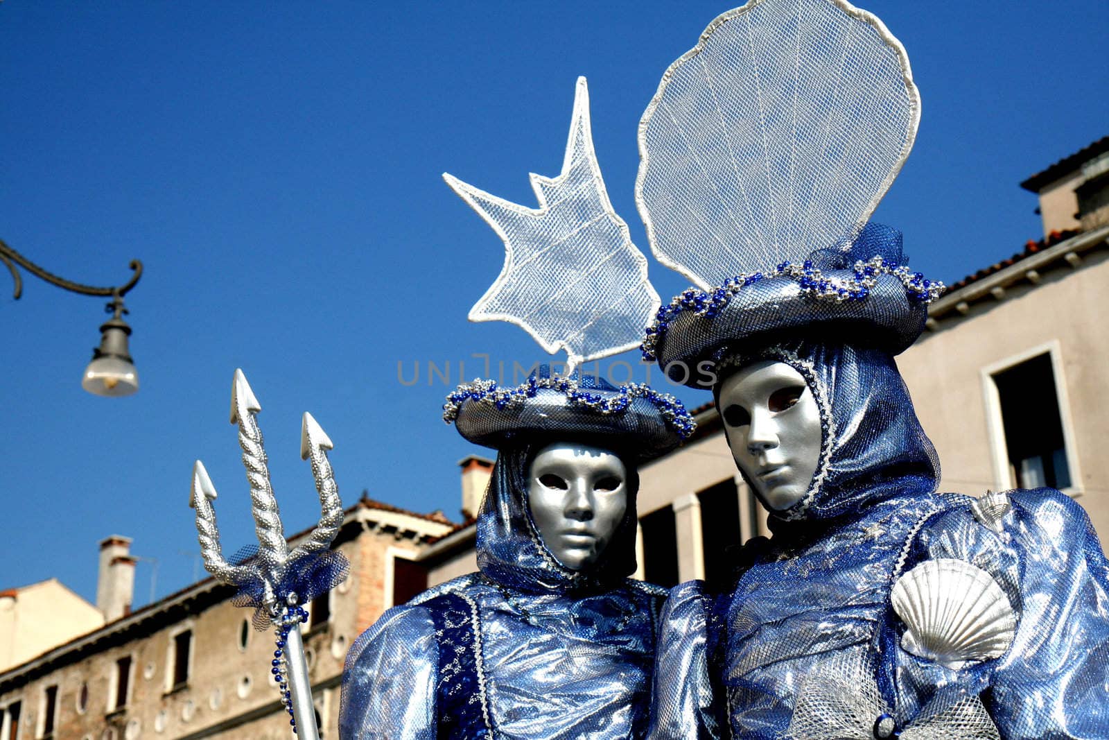 A masked couple,dressd in blue by allg