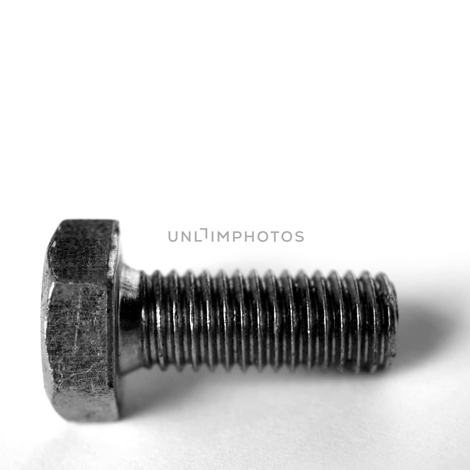 Bolt industrial steel hardware isolated with copyspace