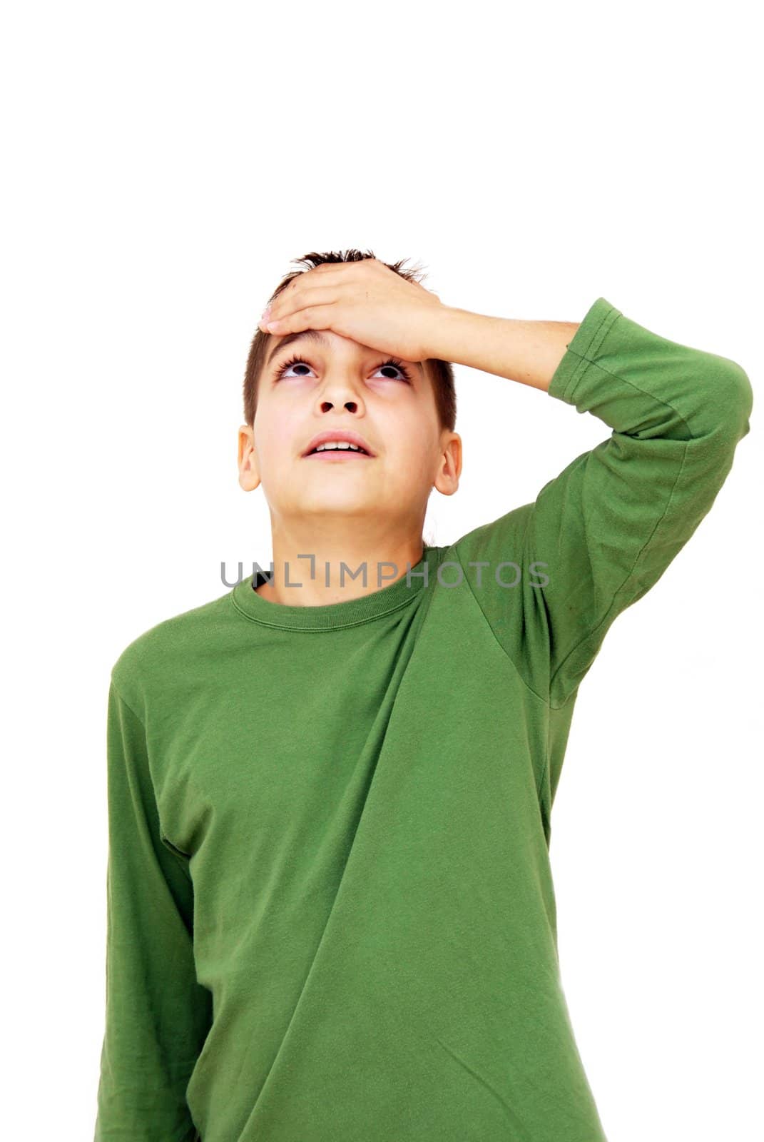 Teenage boy with arm on forehead by simply