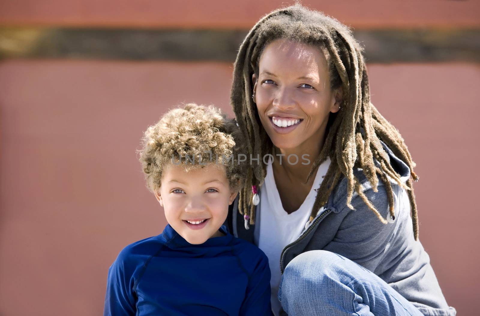 Portrait of mother with cute son outdoors