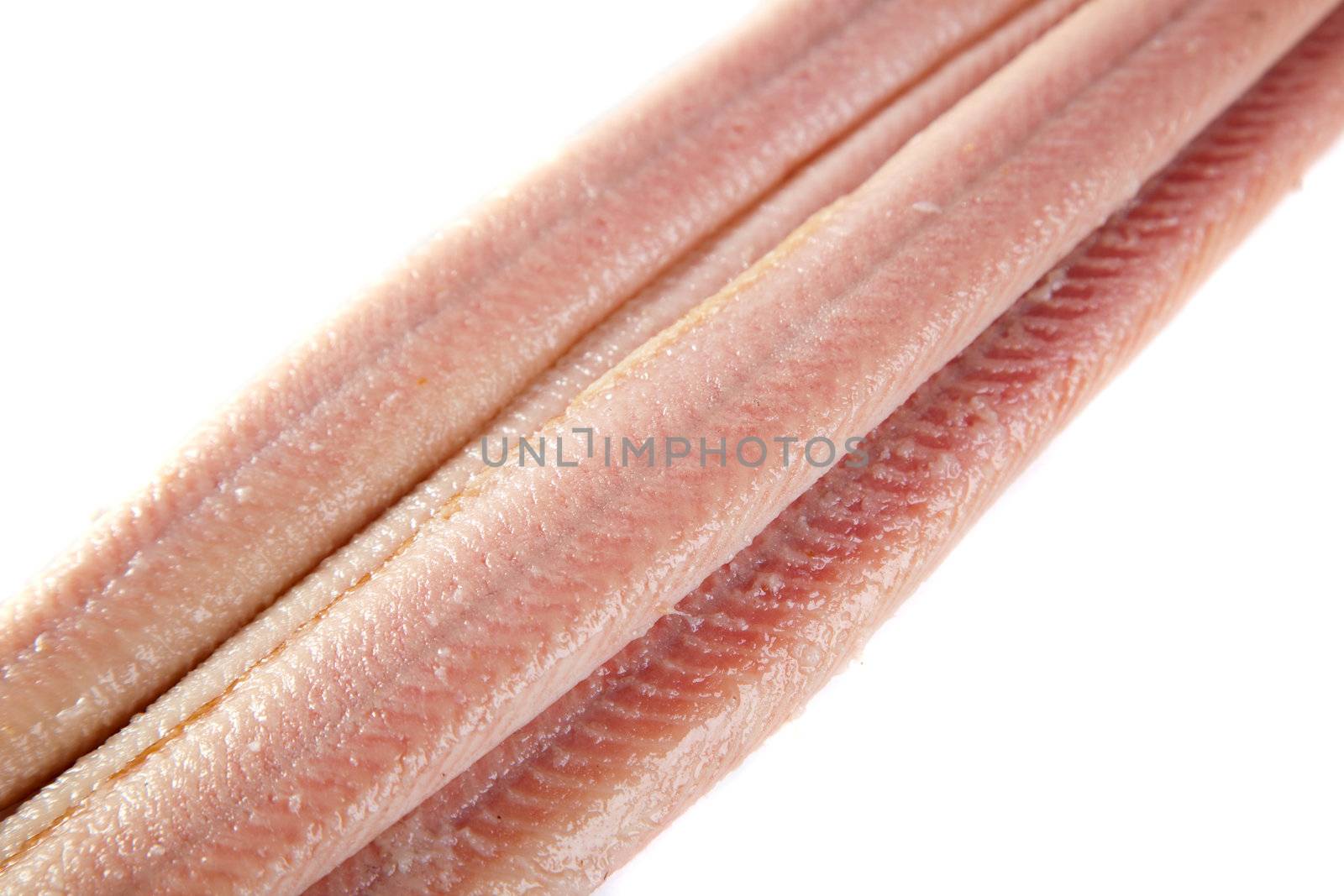 Smoked eel in closeup by Fotosmurf