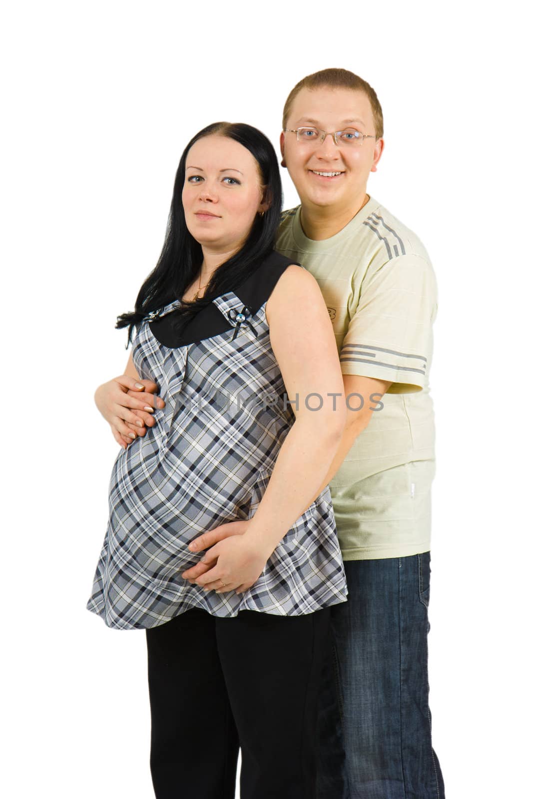 young couple awaiting the birth of a child on an isolated white background
