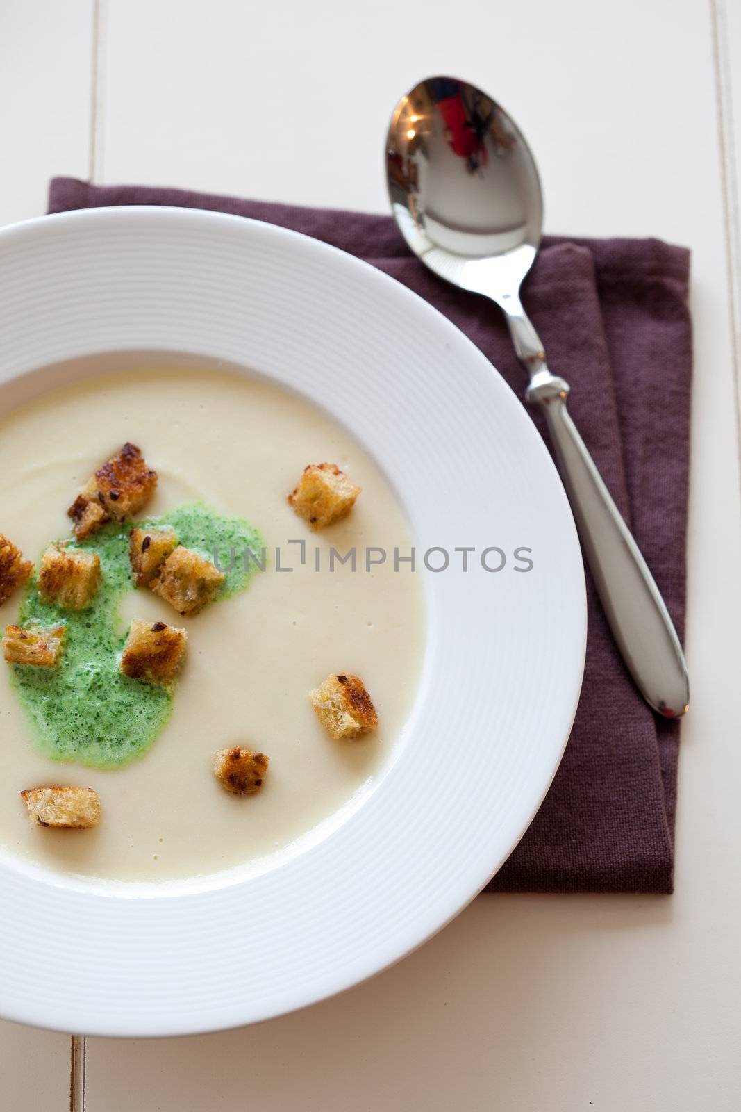 Autumn soup with parsnip, parsley cream and croutons