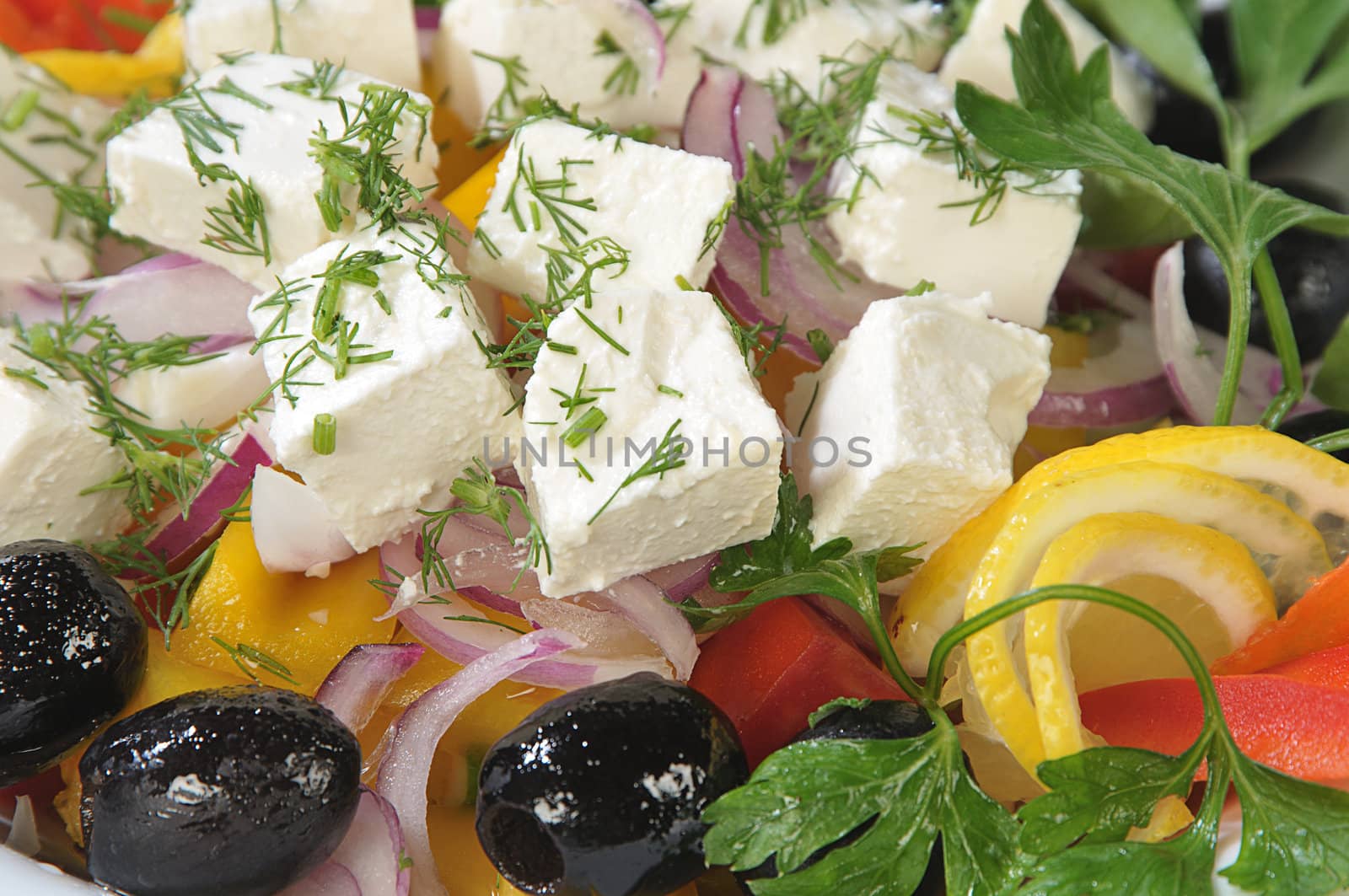 Close-up slices of cheese in a salad by dyoma