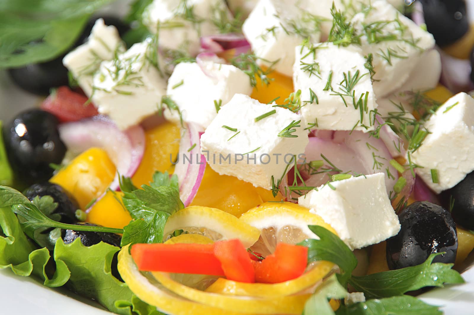 Close-up slices of cheese in a salad by dyoma