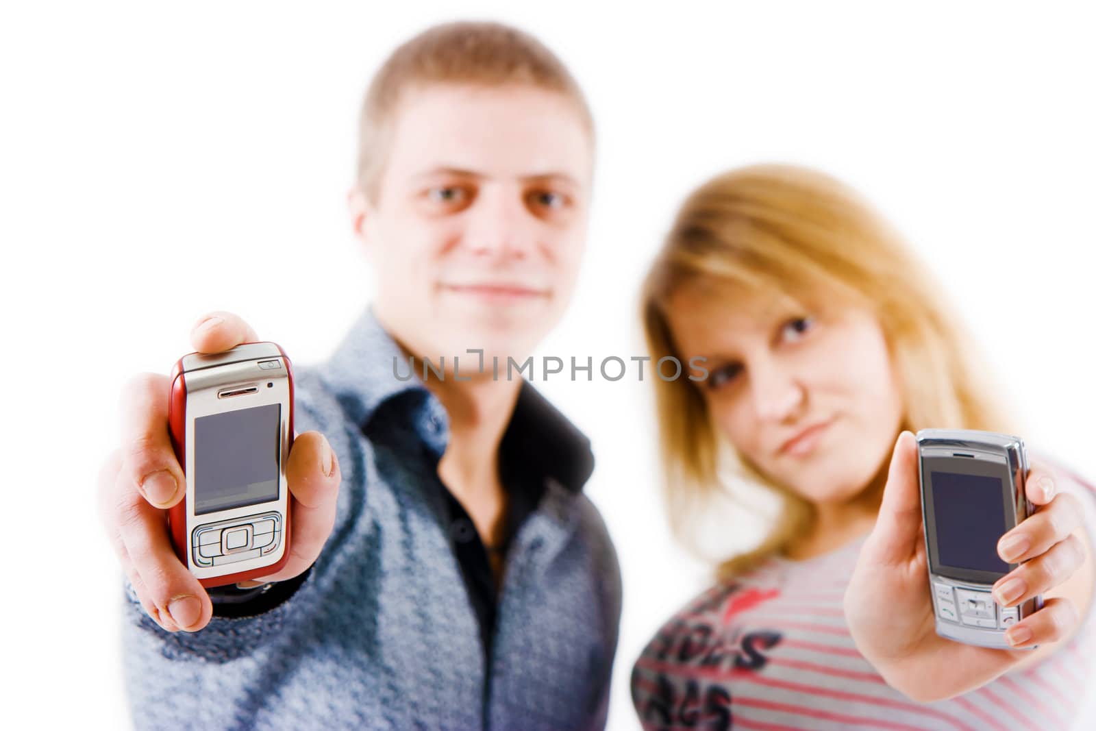 girl and a young man with a mobile phone

