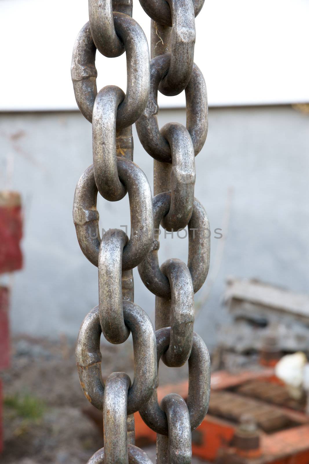 Chain link on construction site by Mirage3