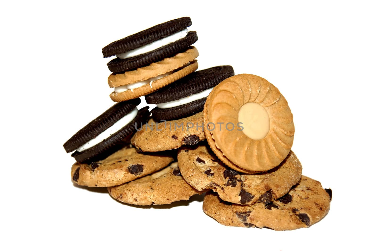 Close-up of a pile of different cookies isolated on white.Mmm.