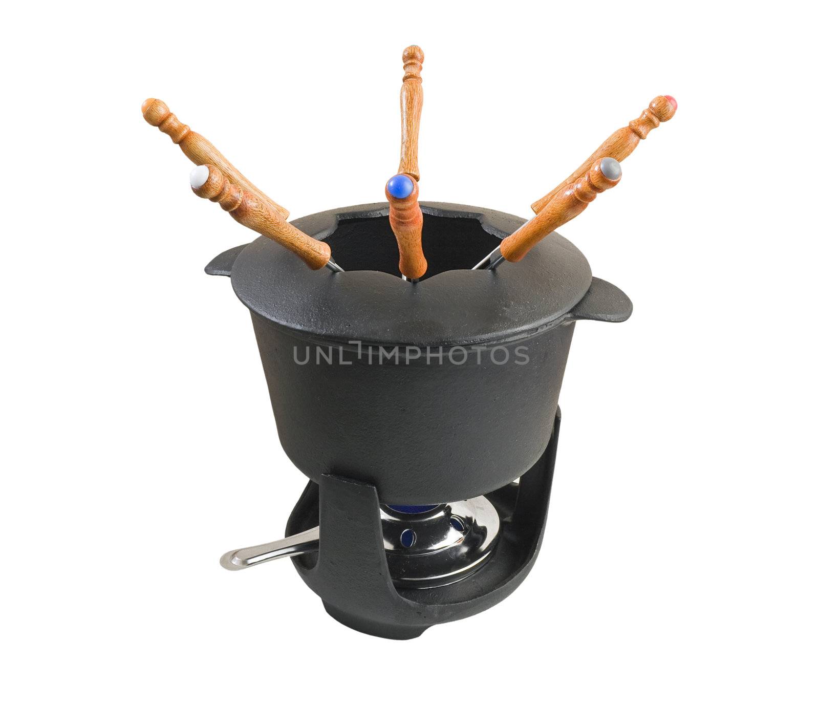 Characteristic cast iron set used for fondue or bourguignonne
