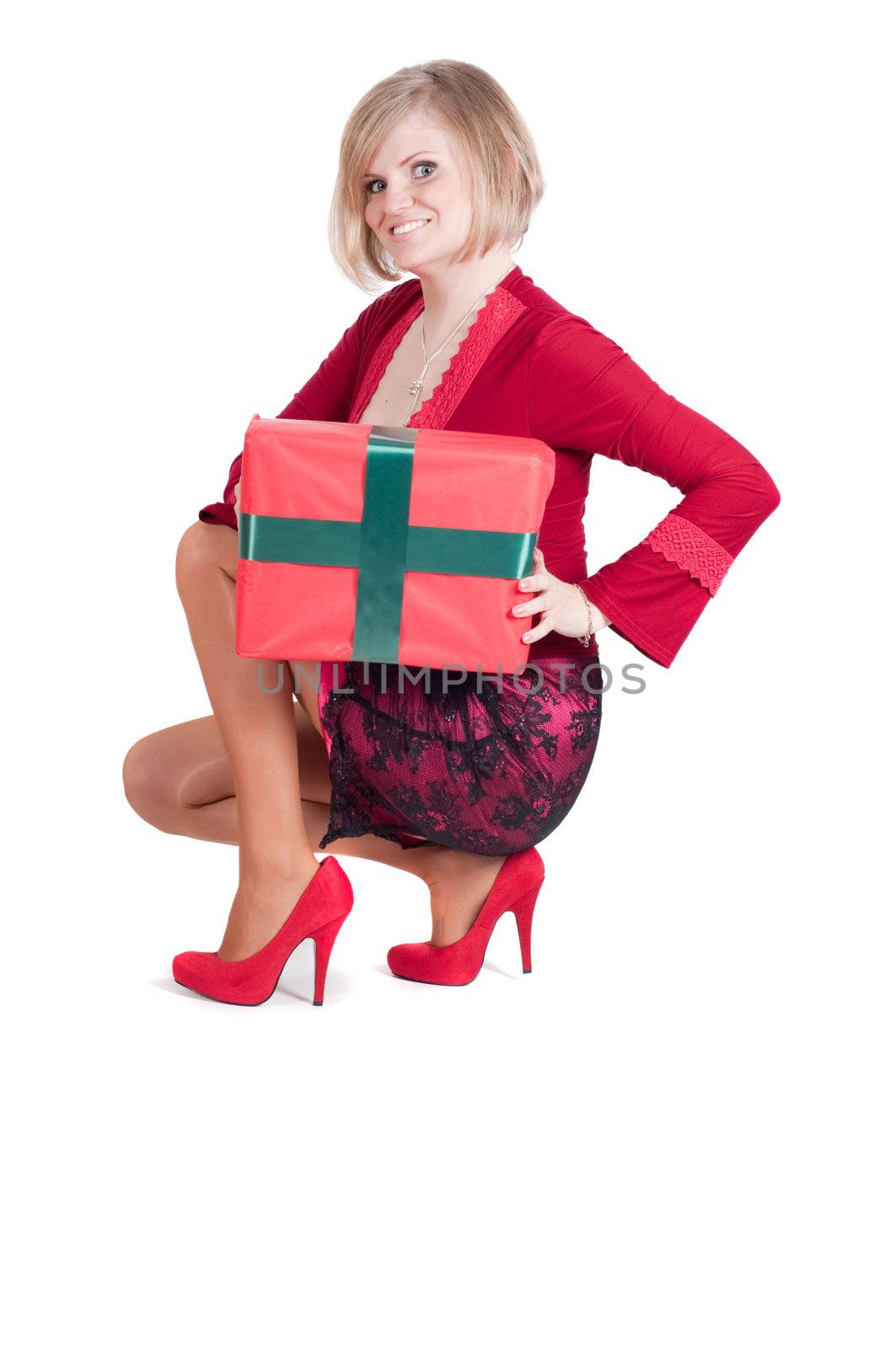 Happy woman with Christmas presents isolated on white