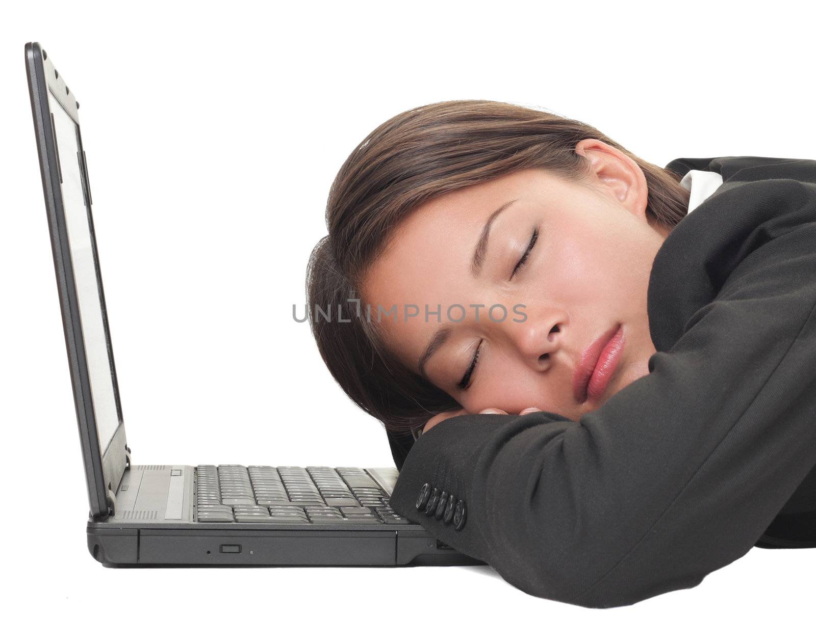 Woman sleeping on laptop taking a power nap during work. Isolated on white background.