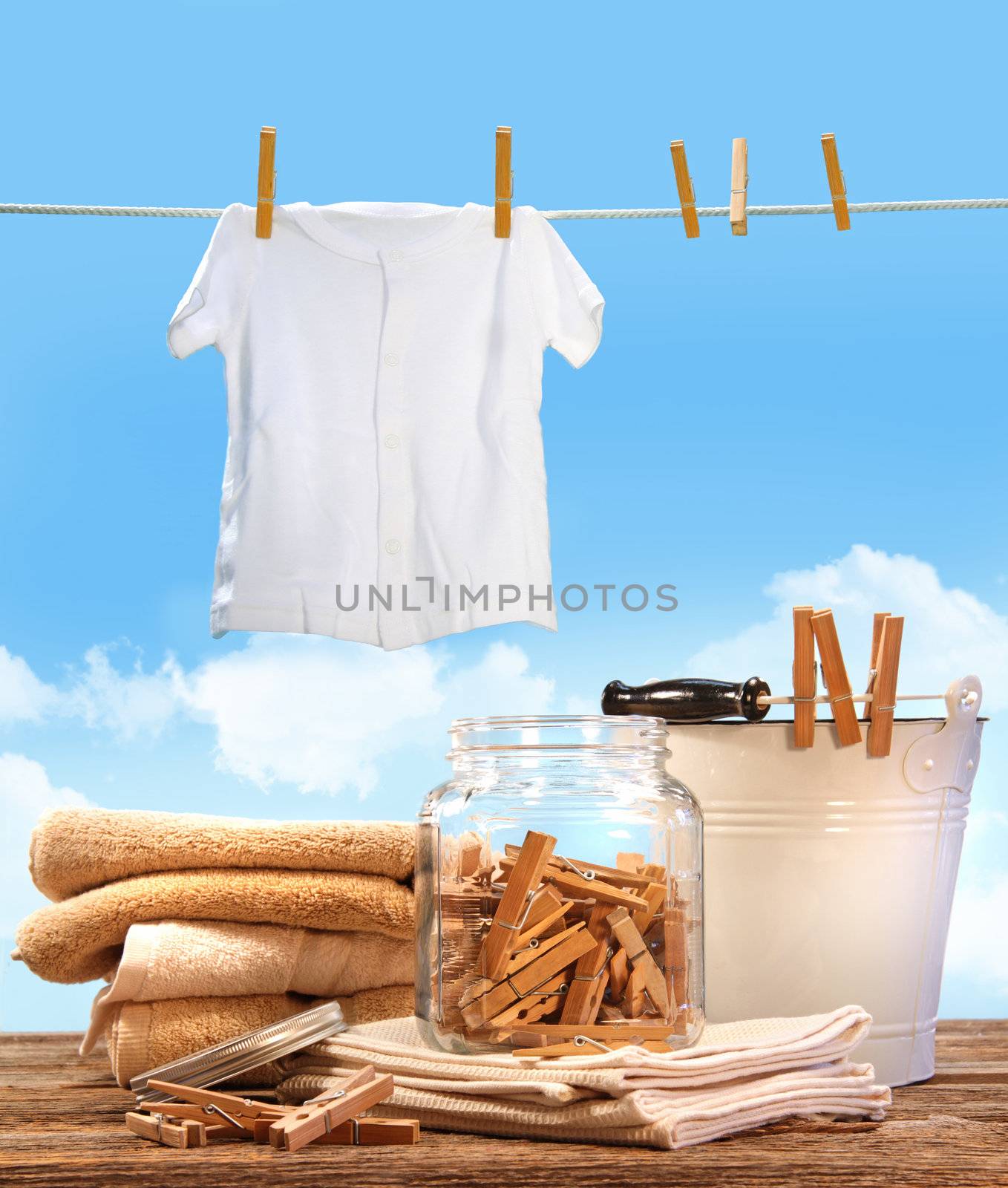 Laundry day with towels and t-shirt on clothesline