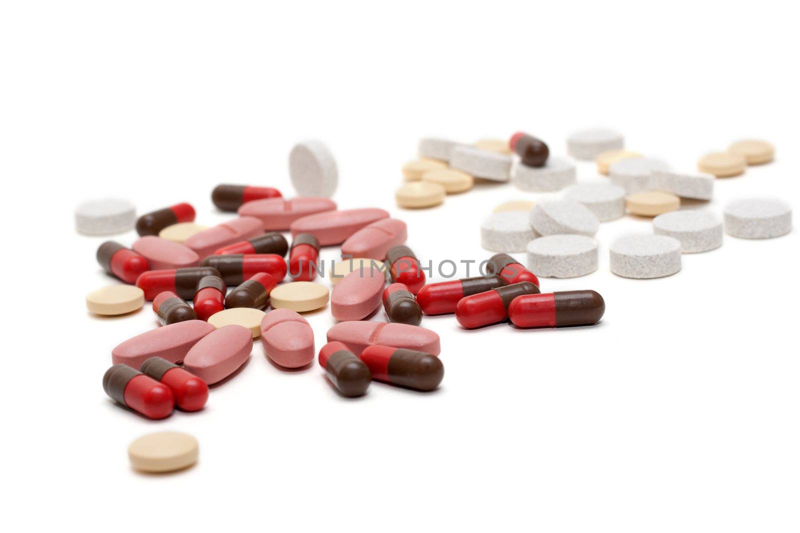 Disposit of the tablets, pill, capsules insulated on white background