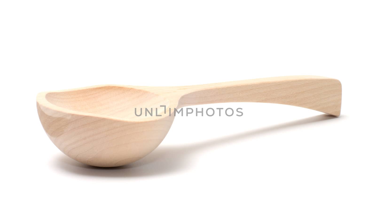 Wooden spoon it is isolated on a white background.