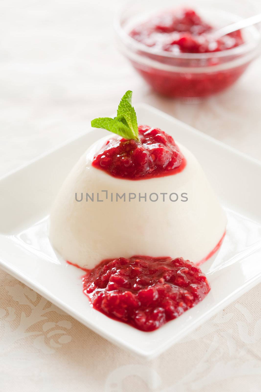 Lemon buttermilk pannacotta with raspberry coulis