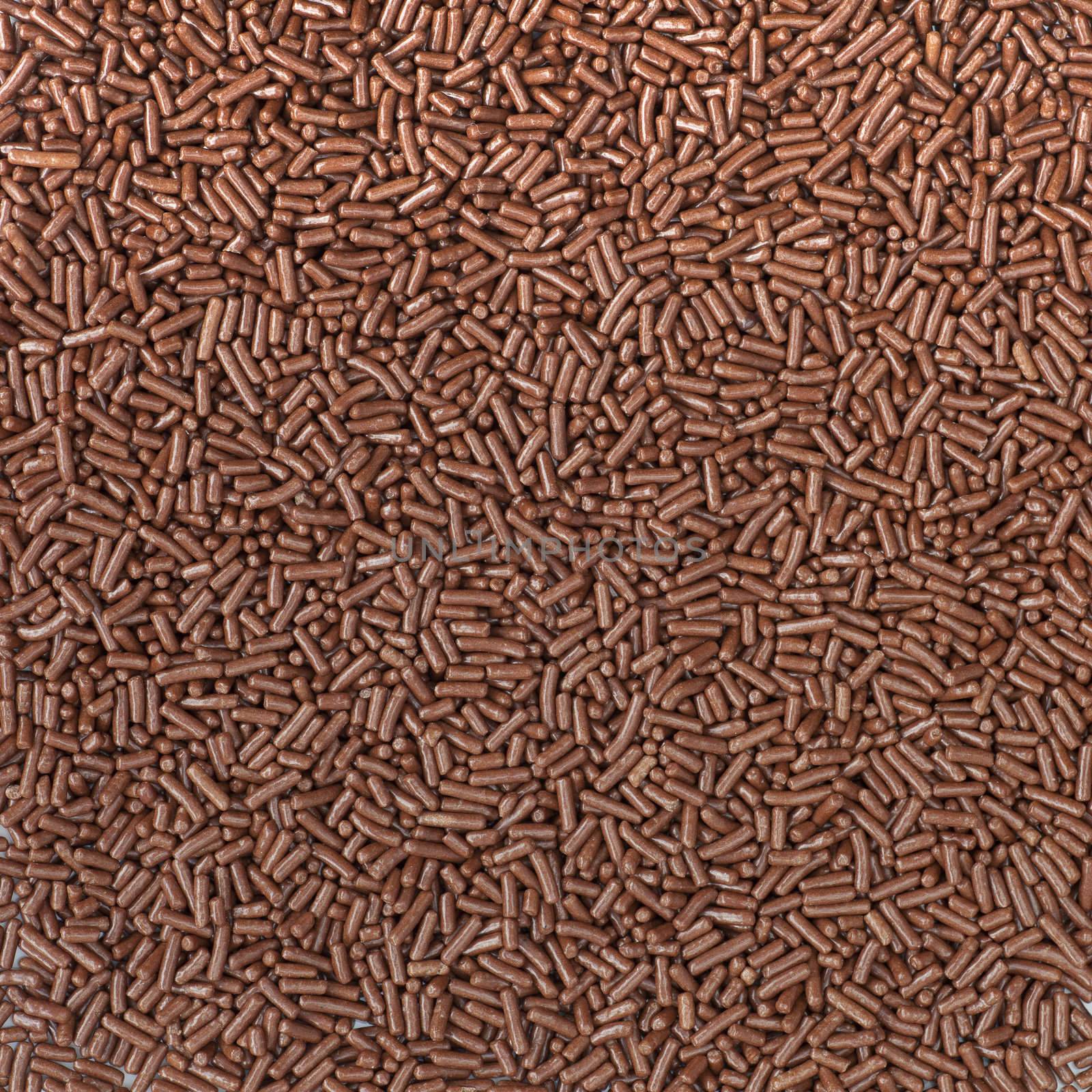 Milk chocolate sprinkles in square format.  Great food texture background.