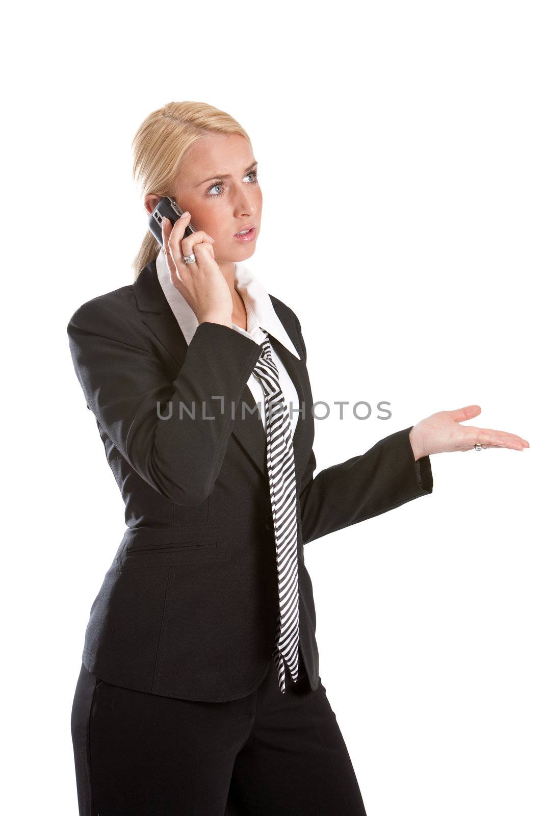 Pretty young business woman talking on the phone looking irritated