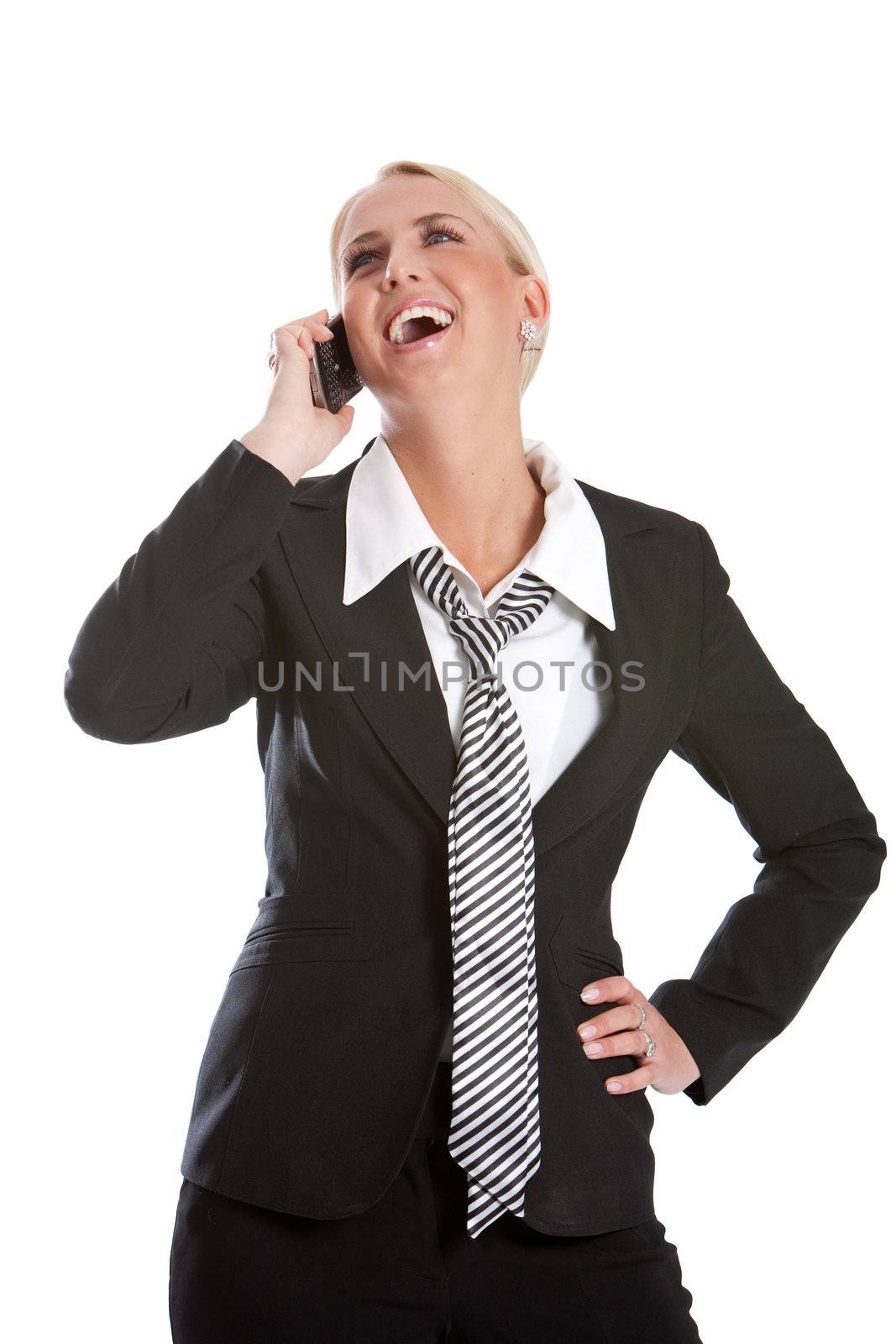Beautiful business woman listening to her phone laughing