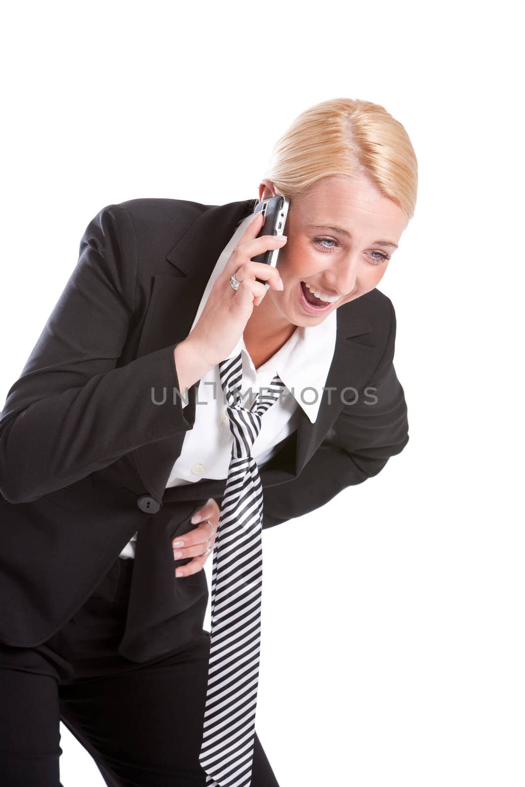 Business woman on the phone laughing out loud