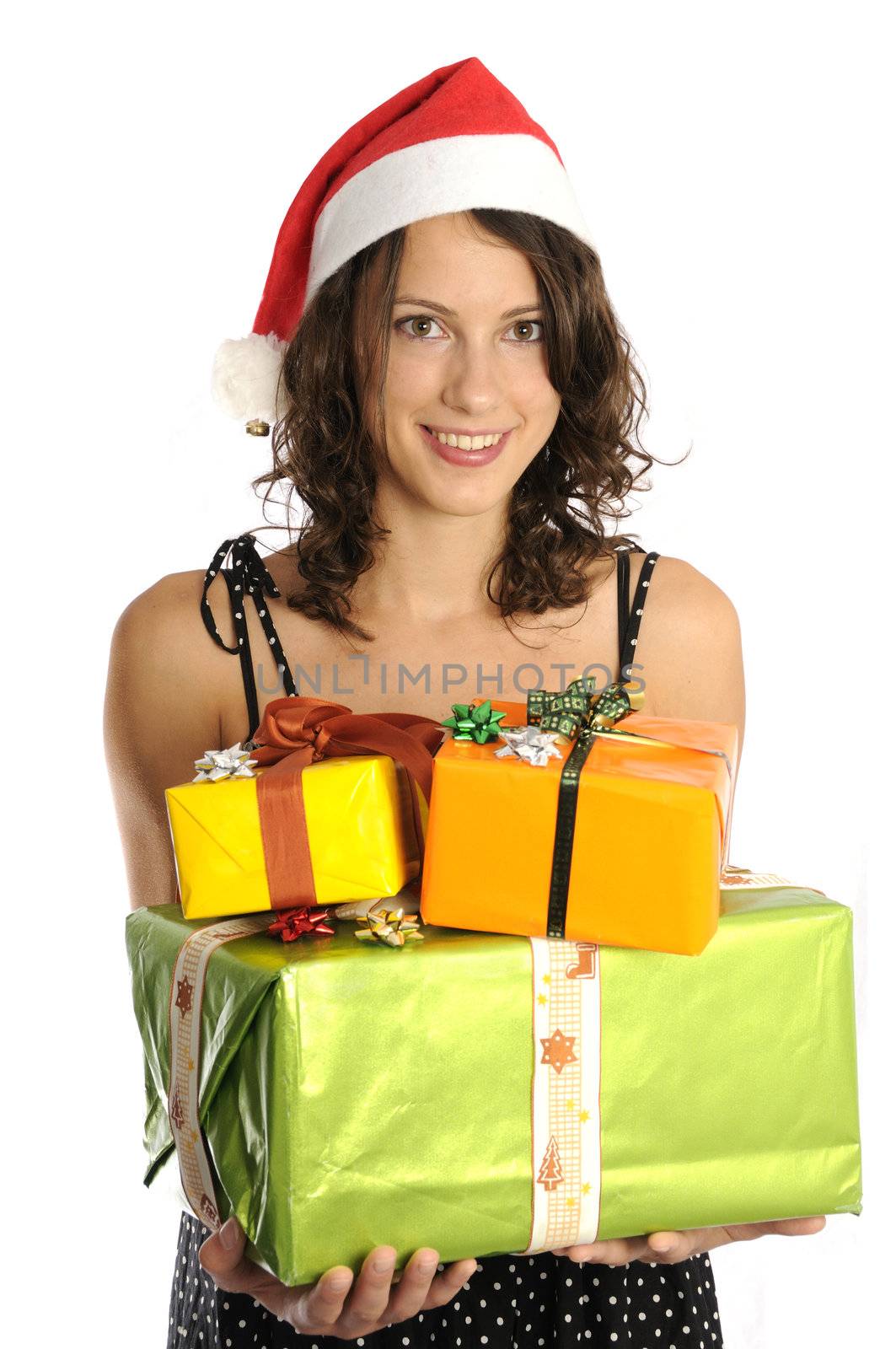 Pretty girl holding christmas presents isolated on white background