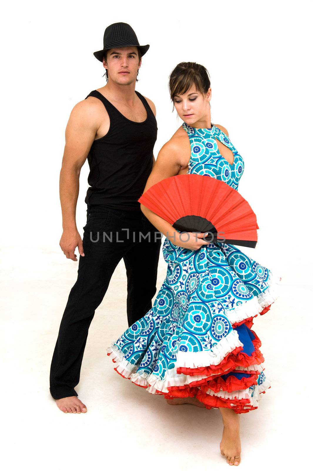 young dancing couple posing and female holding red chinese fan by Ansunette