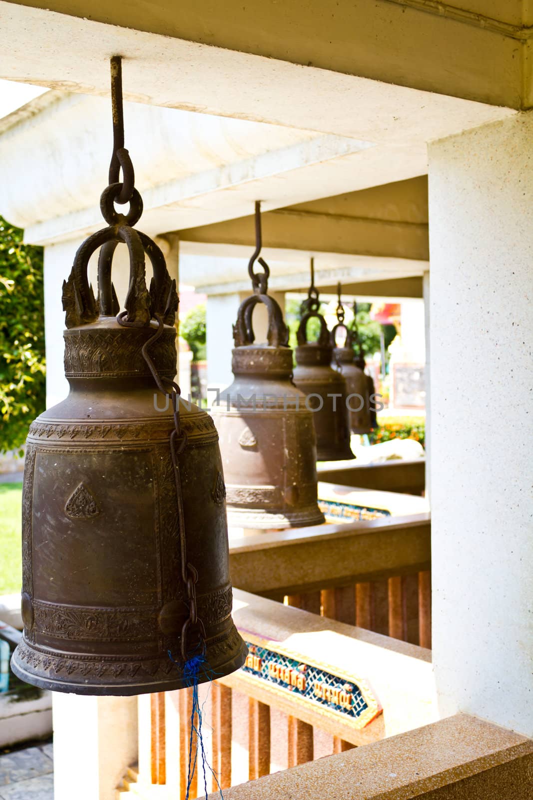 Old bells in a buddhist temple of Thailand by lavoview