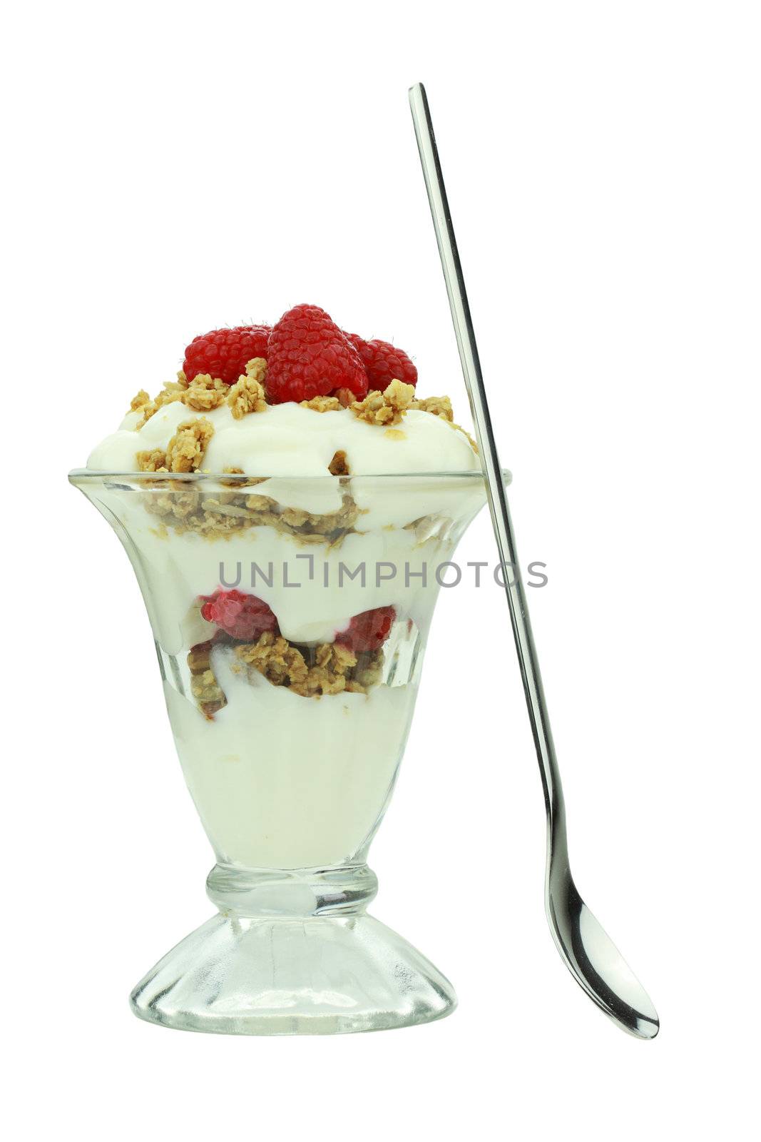 Fruit parfait with healthy granola, vanilla yogurt and fresh raspberries isolated on a white background.