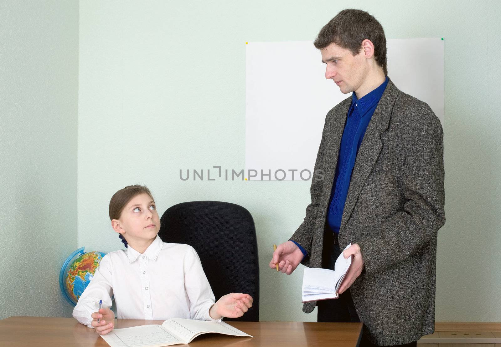Tutor in a suit and its small schoolgirl