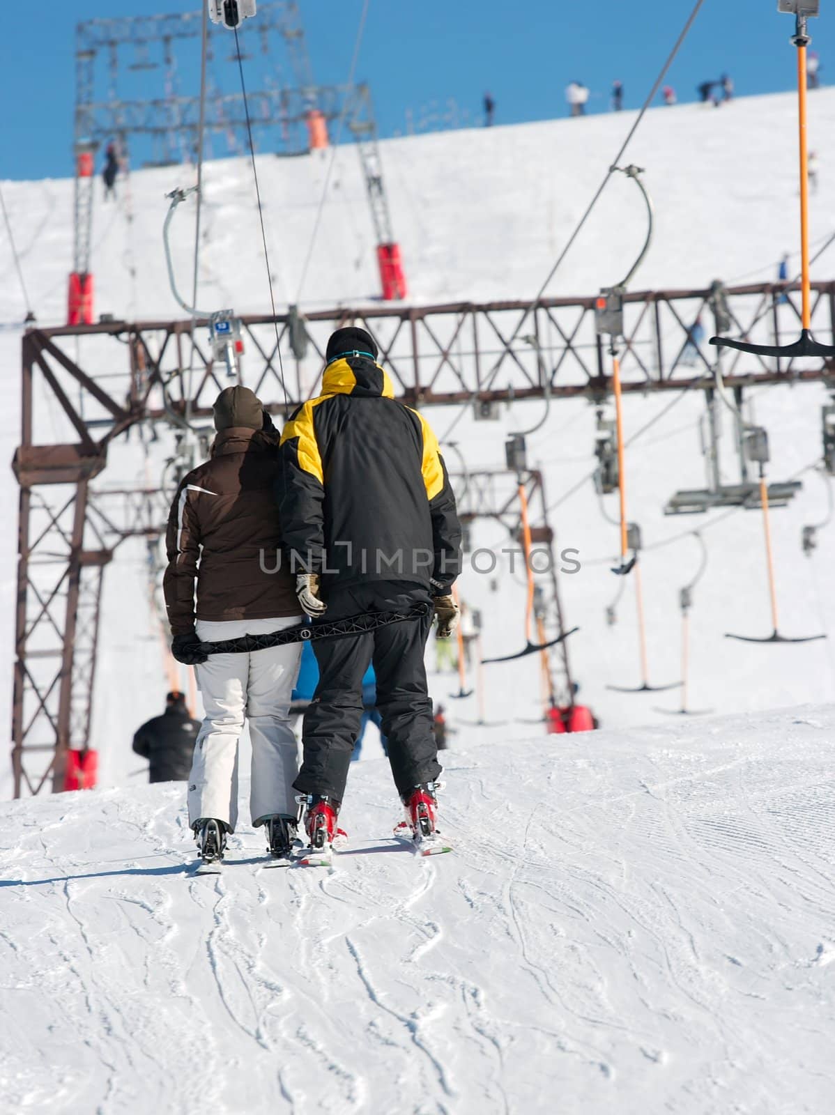 Skiers on a ski lift