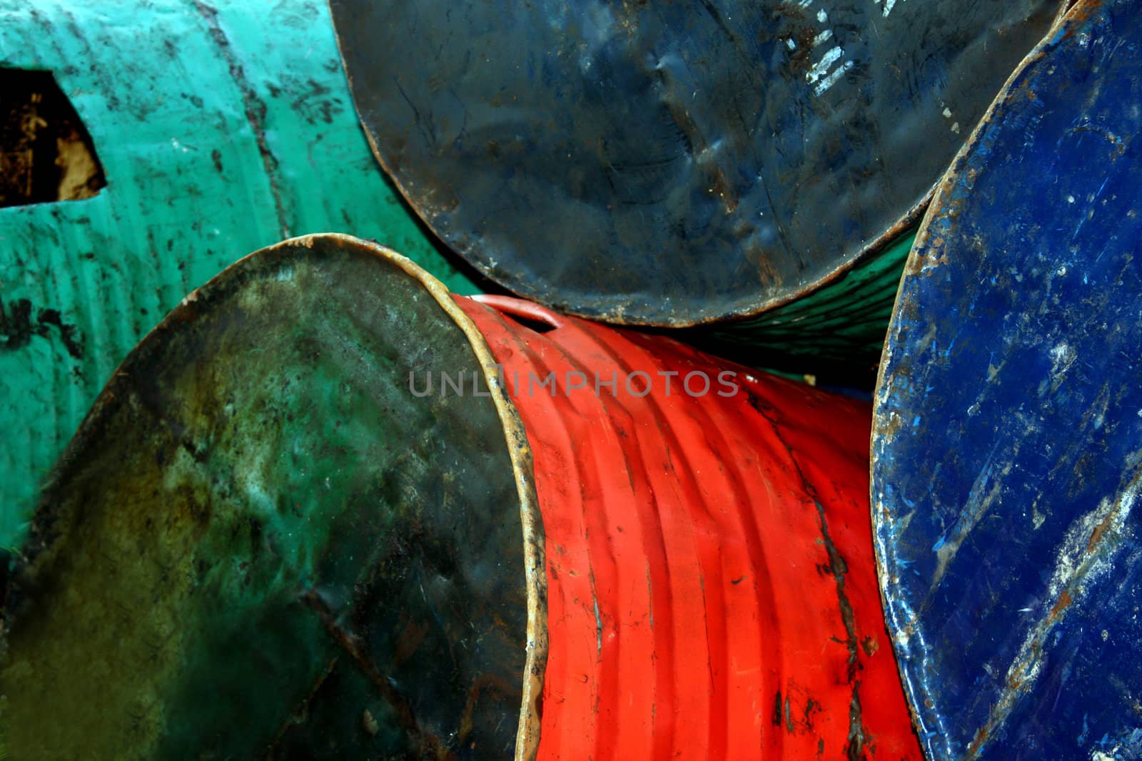 A background of old oil drums.