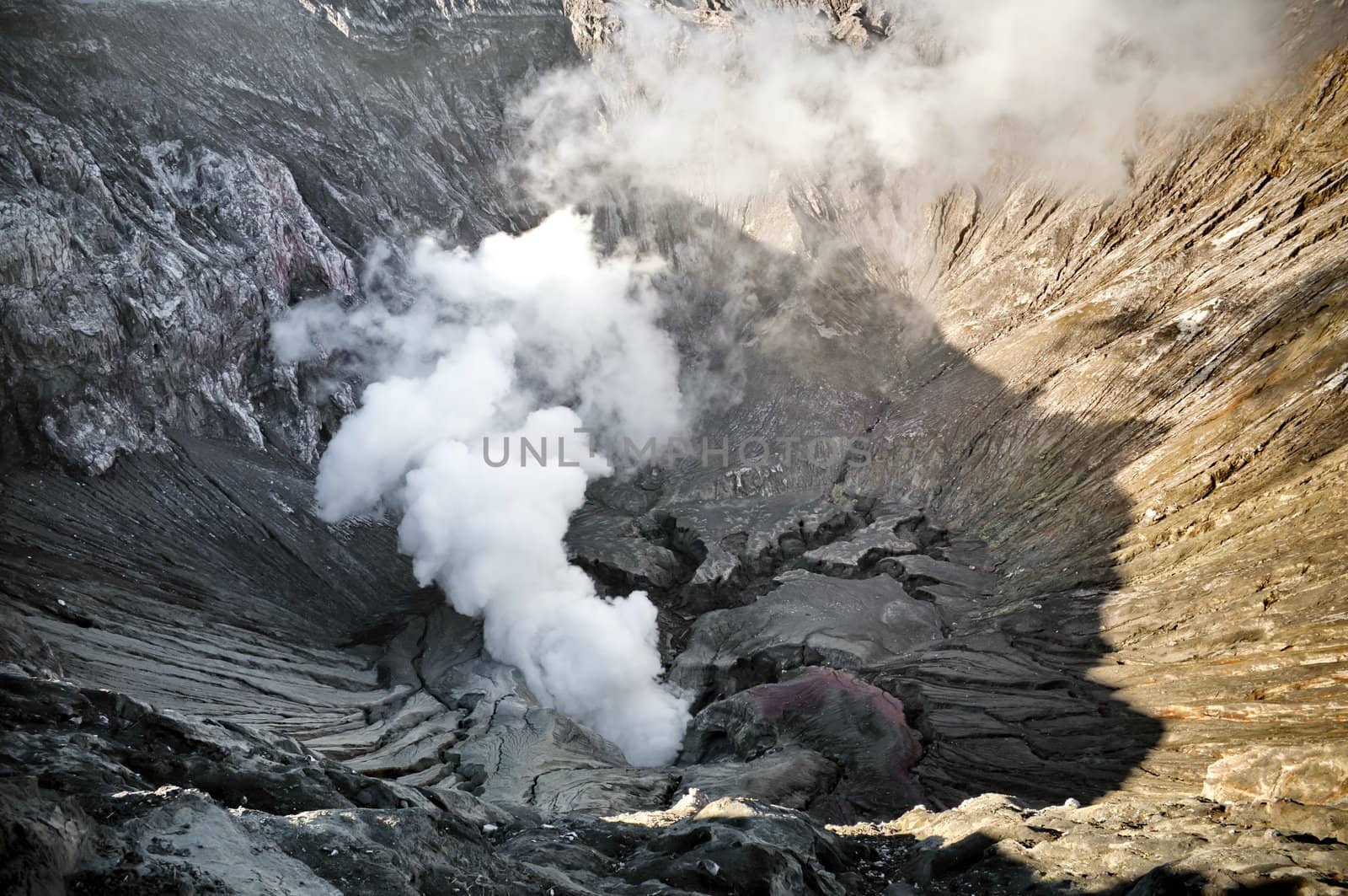 Smoking crater detail in Indonesian volcano Bromo