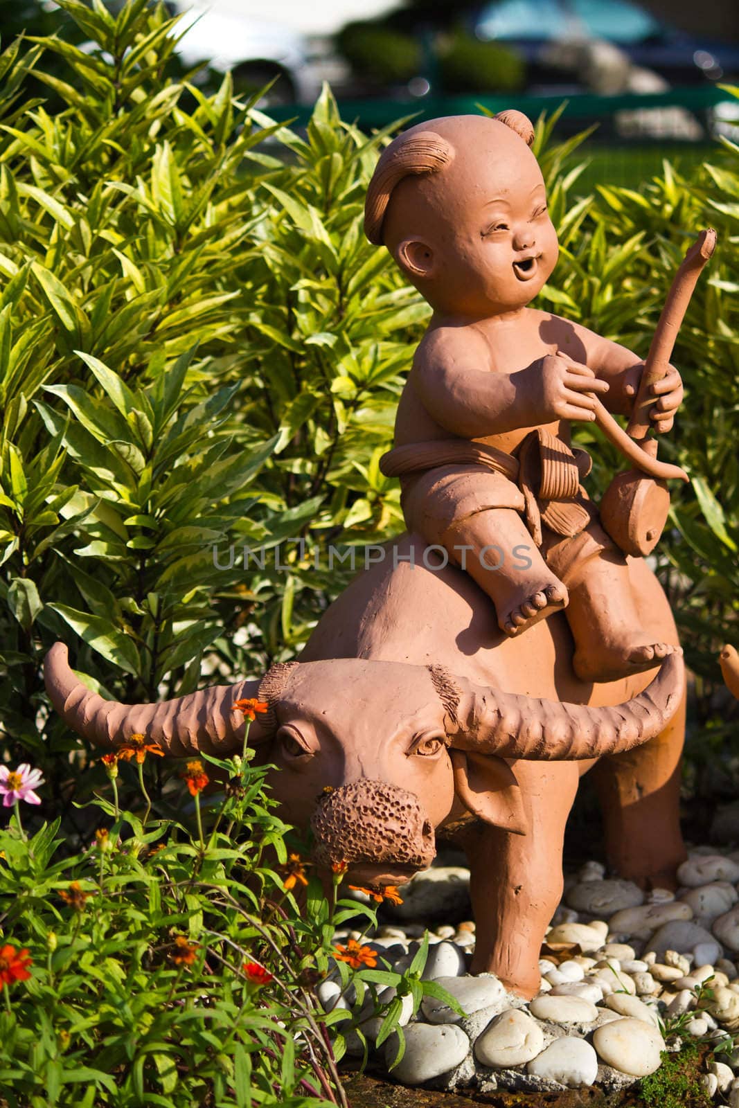 earthenware childs and buffalo by lavoview