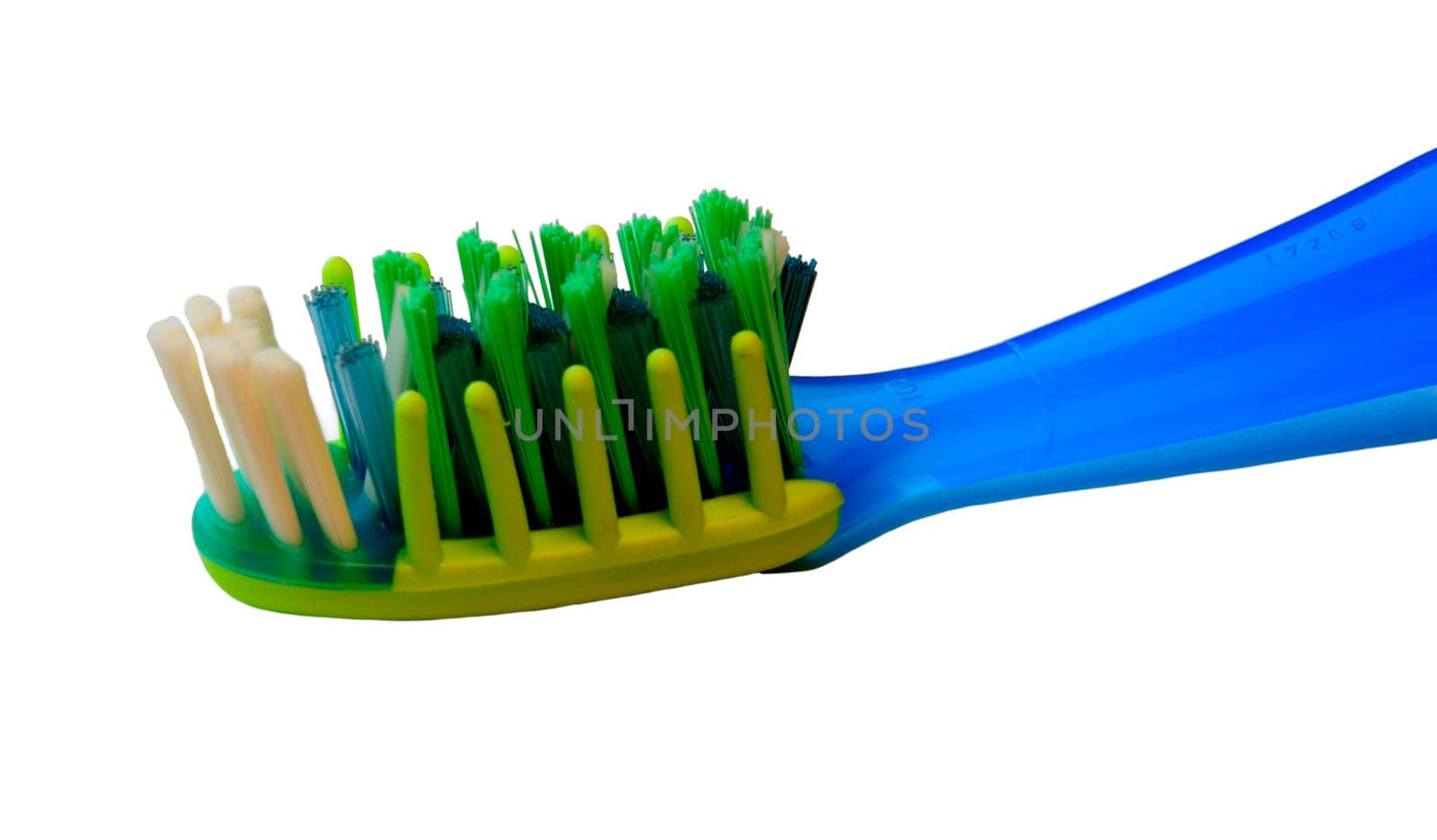 Ttoothbrush on white background, short depth of field.