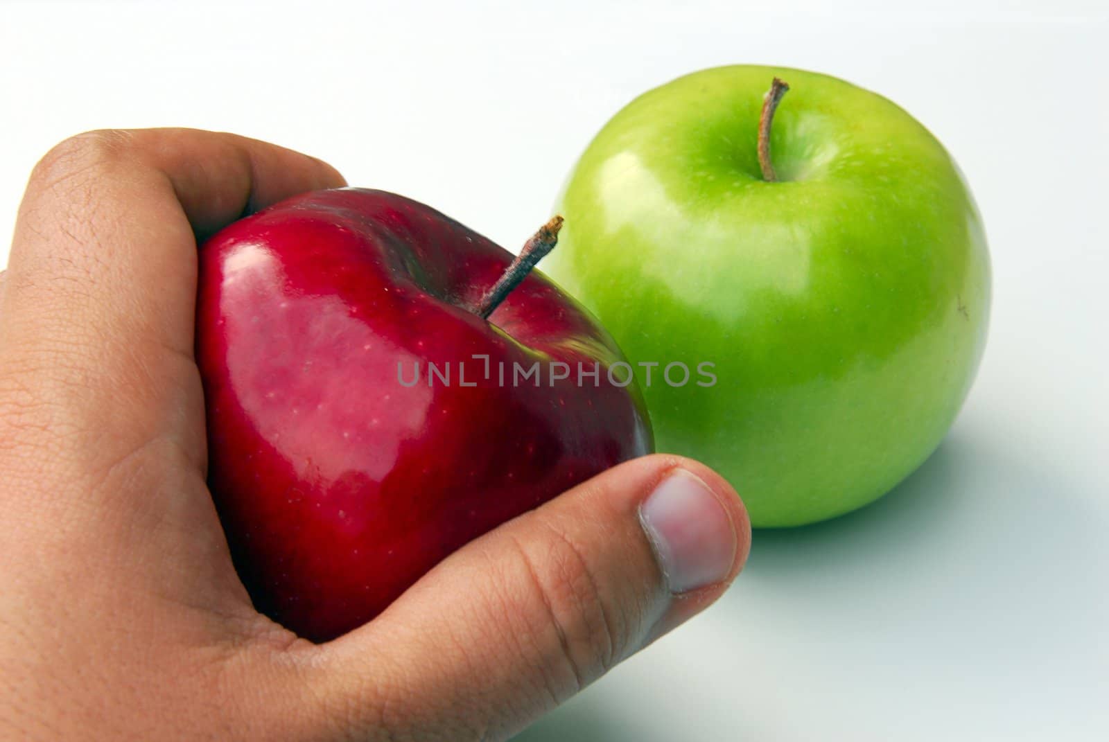An isolated shot of red and green apples