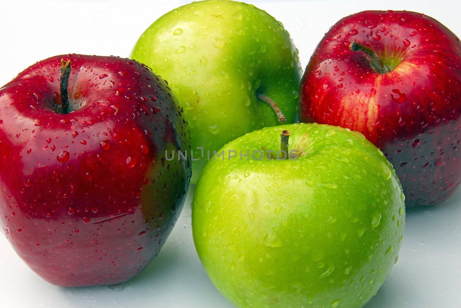 An isolated shot of red and green apples