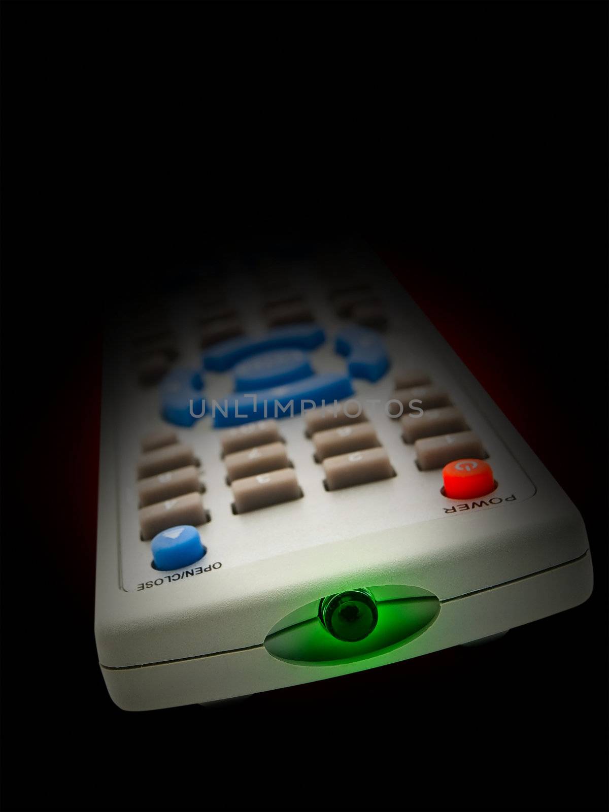 remote control over the black background