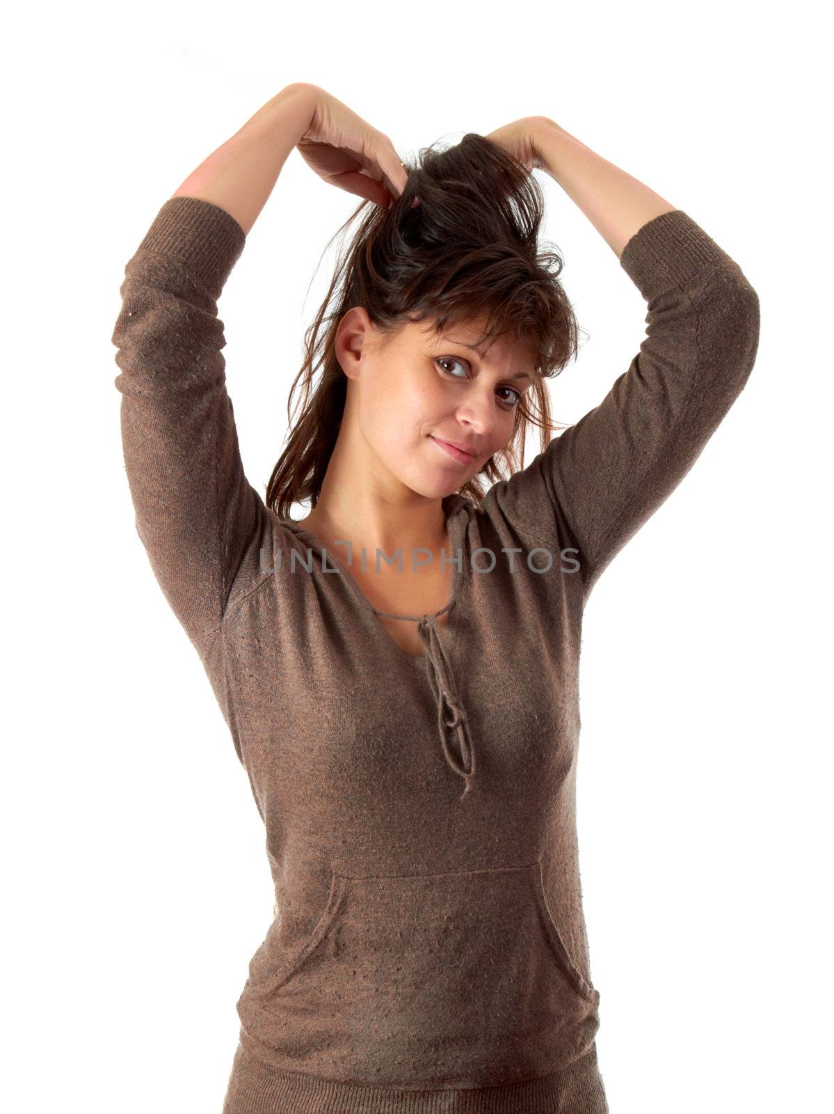 a beautiful young long hair woman in a sport style wear on a white background