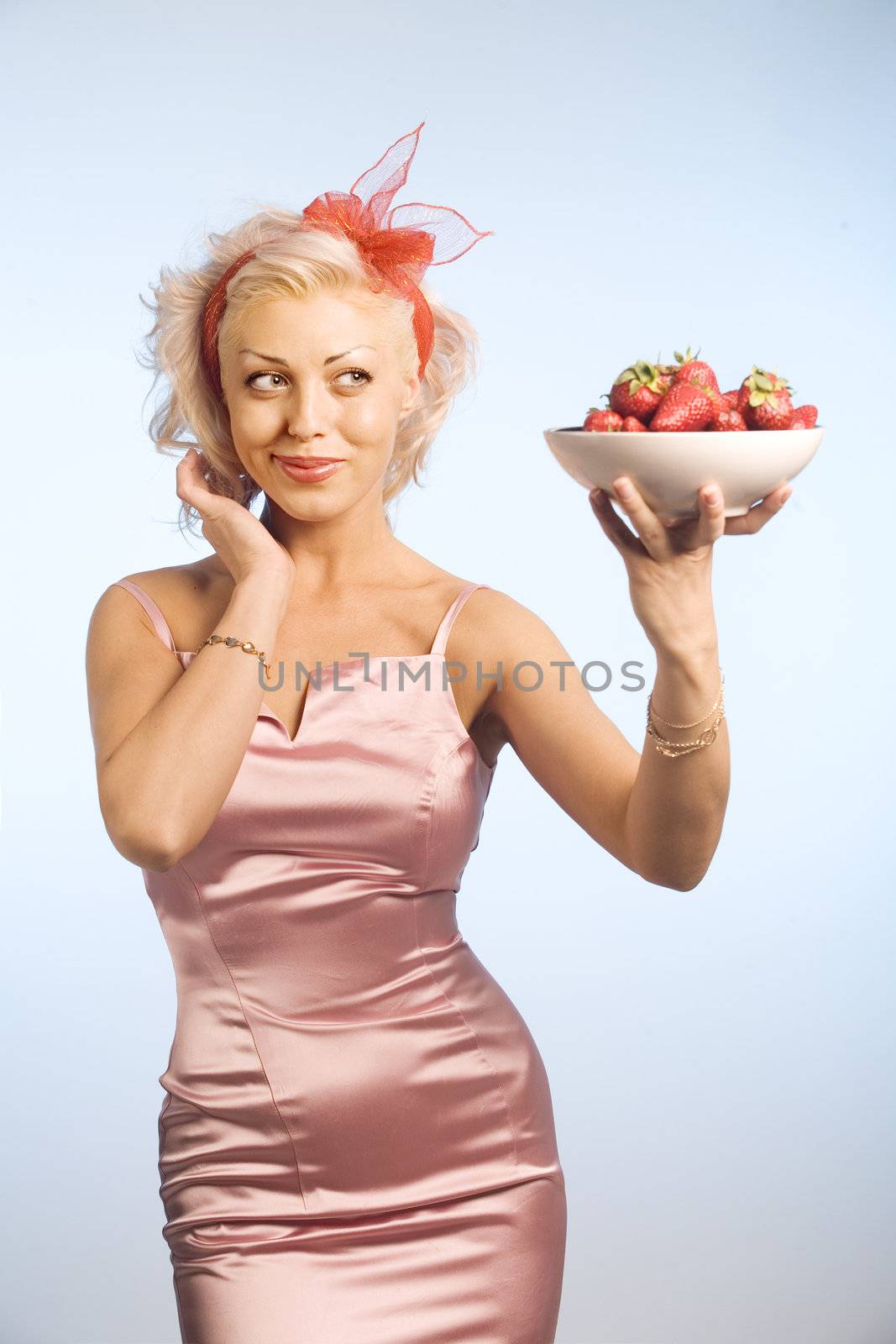 woman with bowl with strawberry by lipik