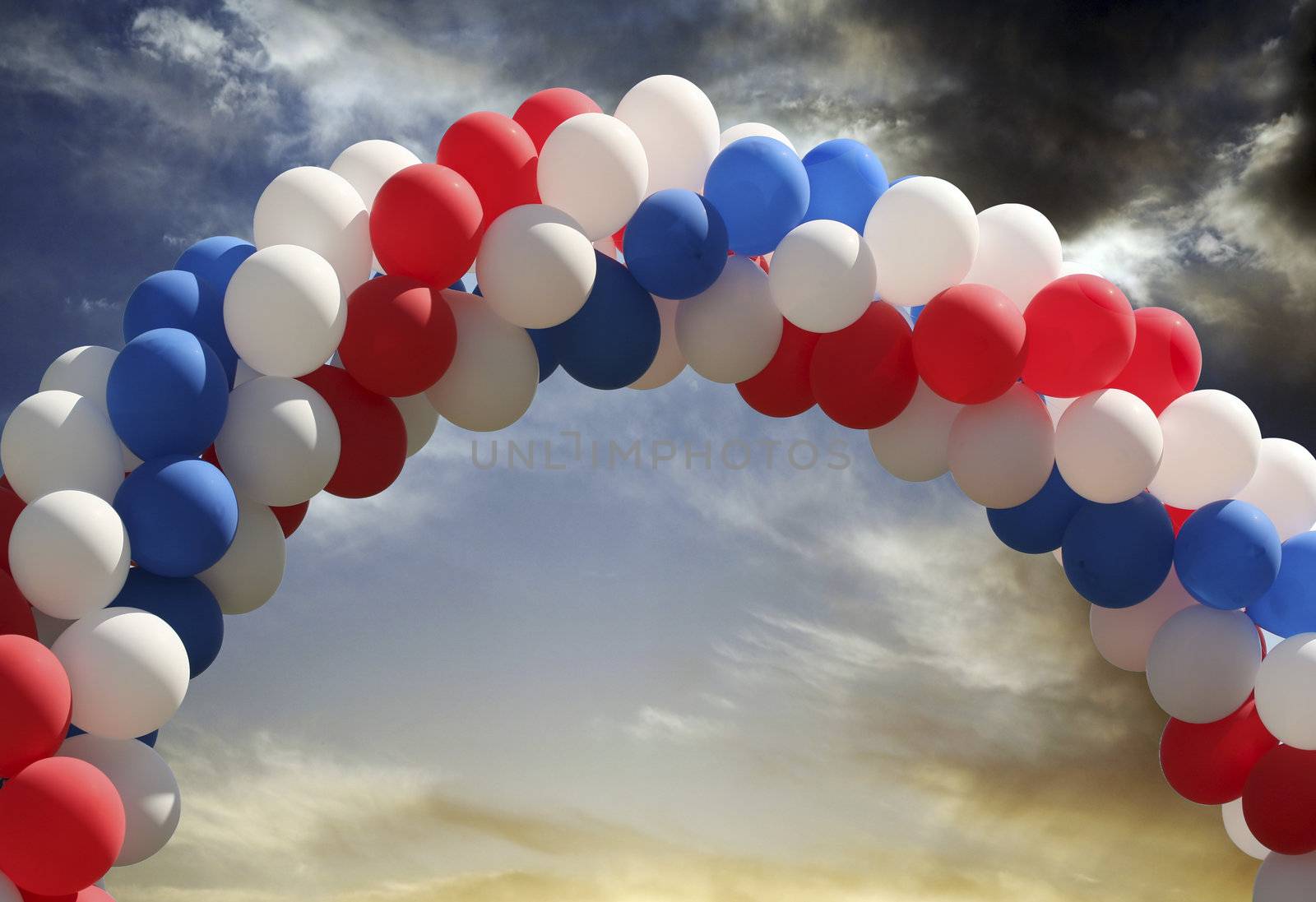 Archway of balloons with evening sky background, digital picture that is great as a photographer's prop for isolated image insertion