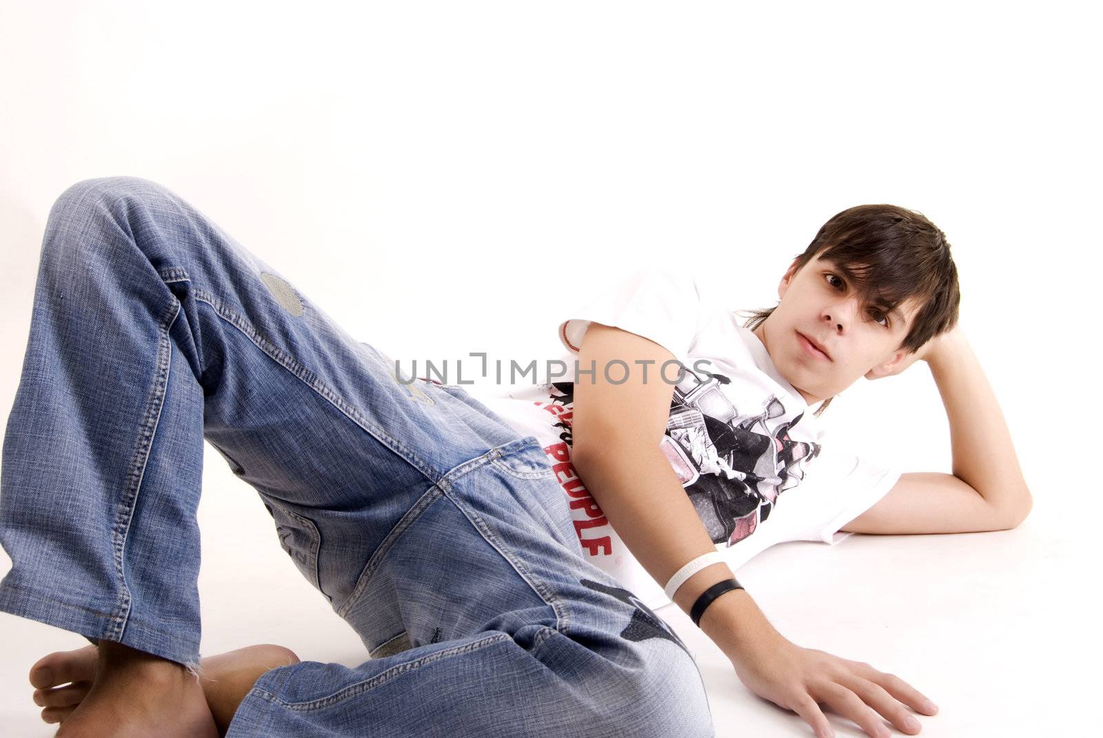 Young guy lying   and looking careless