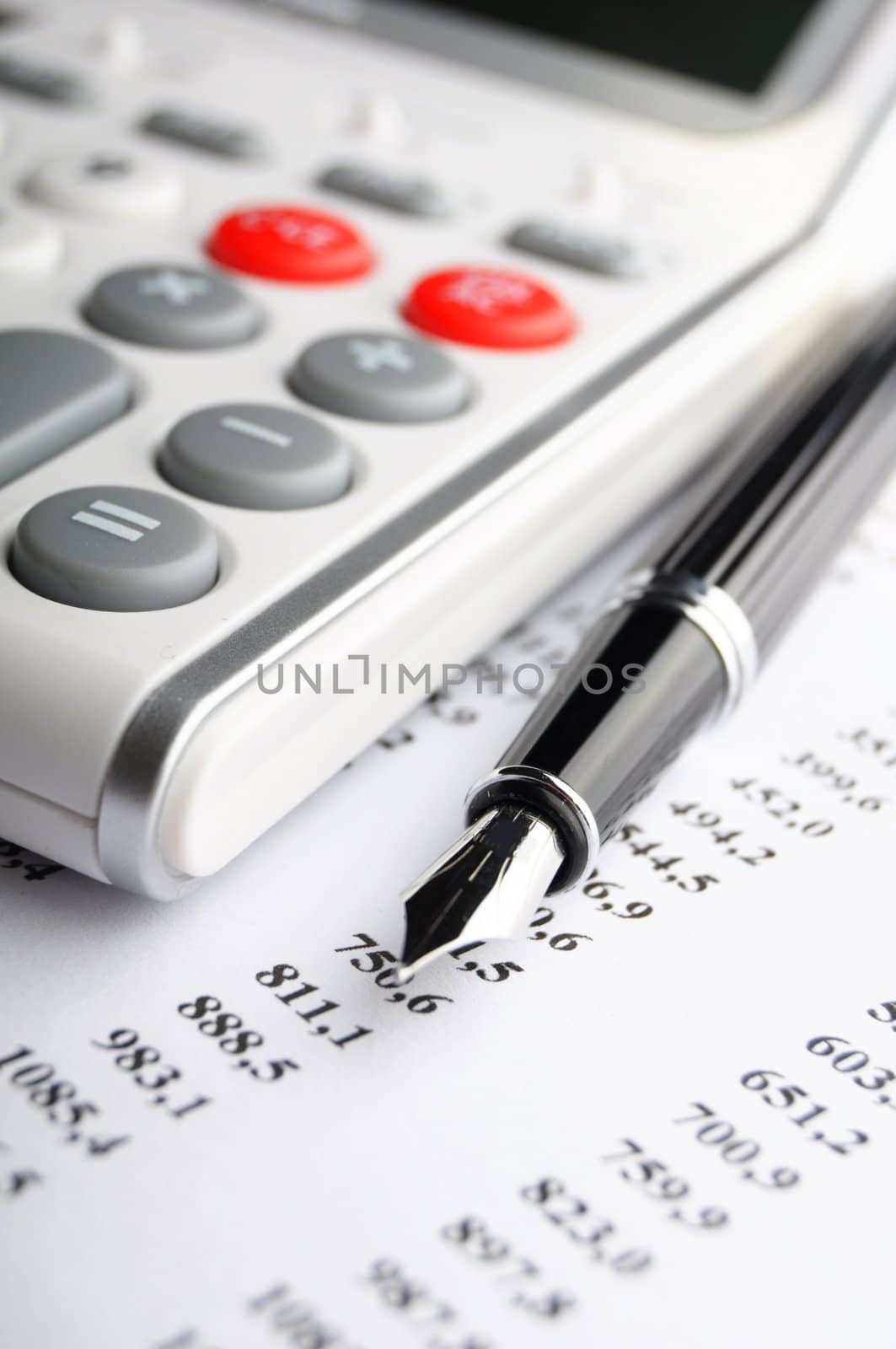 white calculator on office showing financial concept
