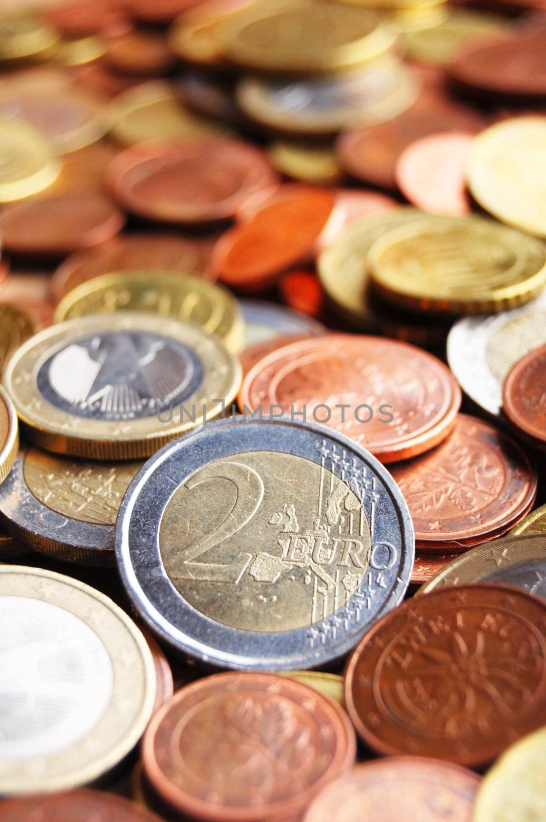 pile of euro money coins showing financial success