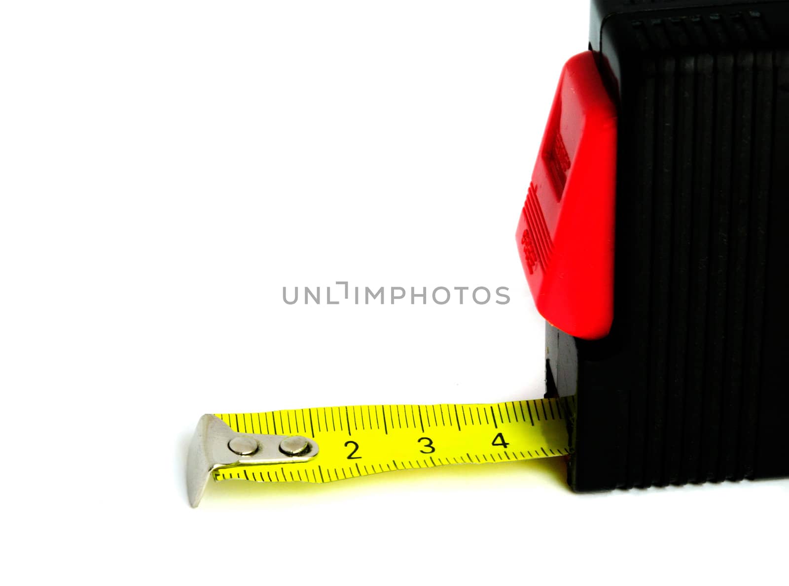Extended retractable tape measure  on a white background 