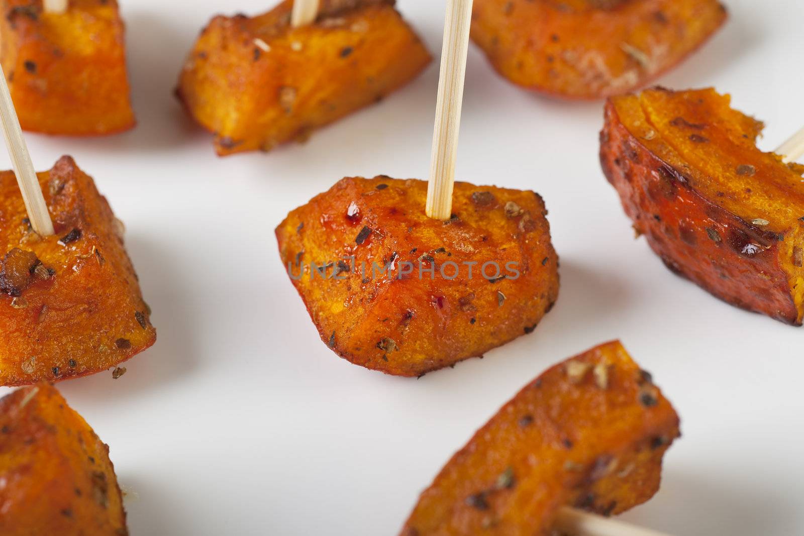 Pumpkin roasted with herbs and spices and served as appetizers.