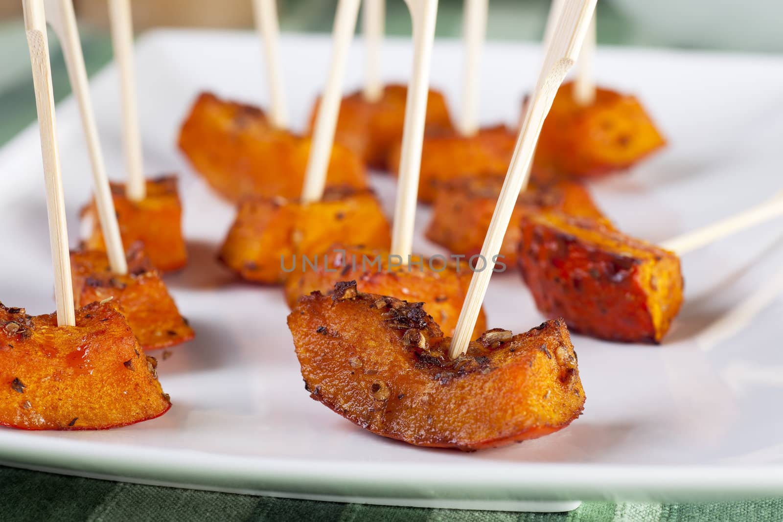 Pumpkin roasted with herbs and spices and served as appetizers.