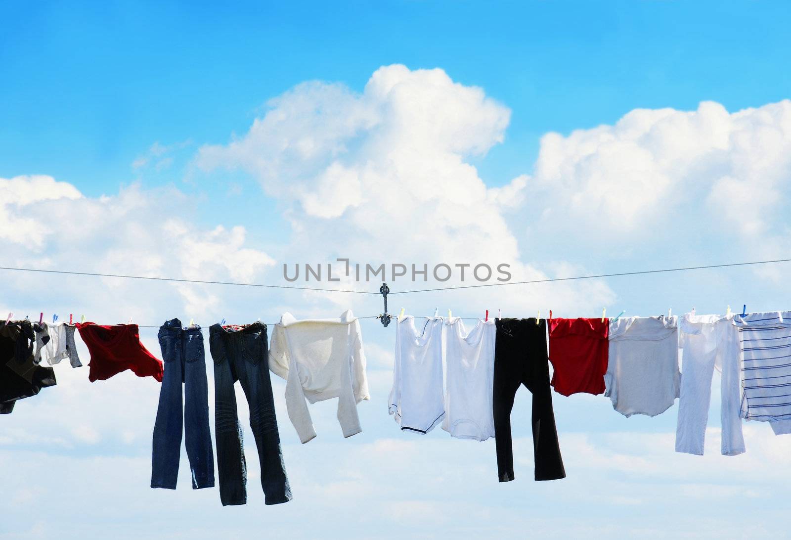 Clothesline and blue sky by Mirage3
