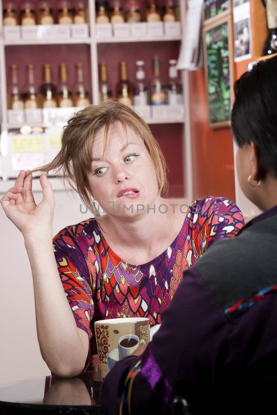 Bored woman in coffee house with male friend by Creatista